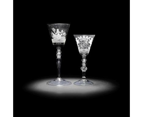 A Dutch engraved light baluster goblet and an armorial wine glass, circa 1750-60The first with a generous round funnel bowl w