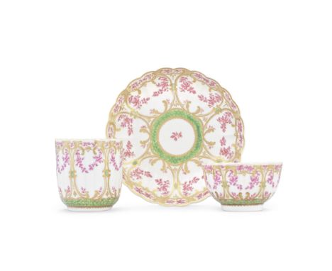 A Worcester teacup, coffee cup and saucer, circa 1775Of reeded French shape, finely decorated in Sèvres style with the 'Migno