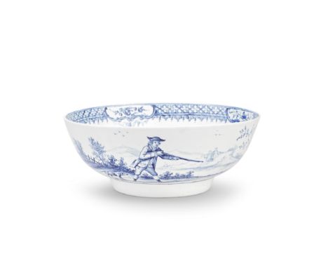 A rare Liverpool (John Pennington) punch bowl, circa 1780Finely painted in blue, the exterior with a continuous grassy landsc