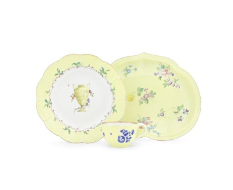 A Worcester dessert plate, a heart-shaped dish and a teacup, the porcelain circa 1770-75The plate with a Giles decorated neoc