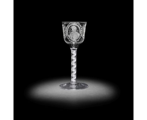 An interesting commemorative opaque twist wine glass of theatrical interest, circa 1770The decoration later, the generous oge