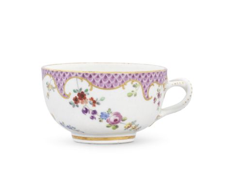 A rare Worcester teacup, circa 1770Decorated in the Giles workshop with three cursive floral garlands suspended from a scroll