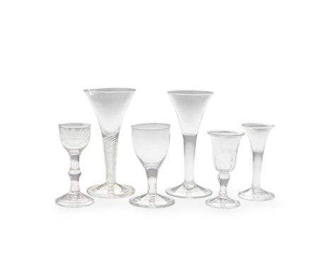 Six various wine glasses, mid-18th centuryComprising a small flute-moulded glass with a bell bowl over a short inverted balus