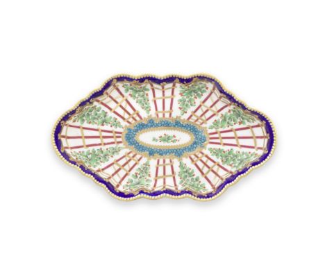 A Worcester spoon tray, circa 1775Of lobed, hexagonal shape, richly decorated with a version of the 'Hop Trellis' pattern, be