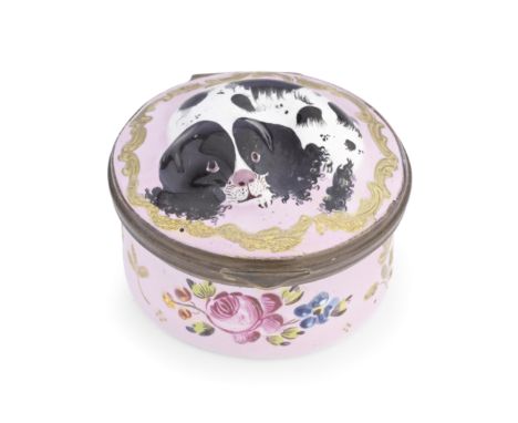 A South Staffordshire enamel spaniel patch box, circa 1770-80Of circular form, the hinged lid moulded in high relief with a r