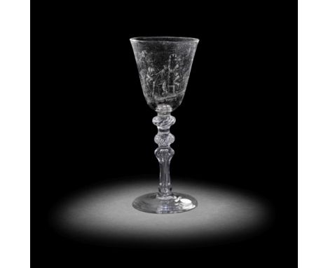 An exceptional Dutch stipple-engraved light baluster goblet by 'Alius', circa 1760-80The generous round funnel bowl finely de