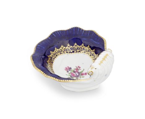 A Worcester sweetmeat dish, circa 1772Of deep shell form, the moulding picked out in gold around the handle, the interior pai