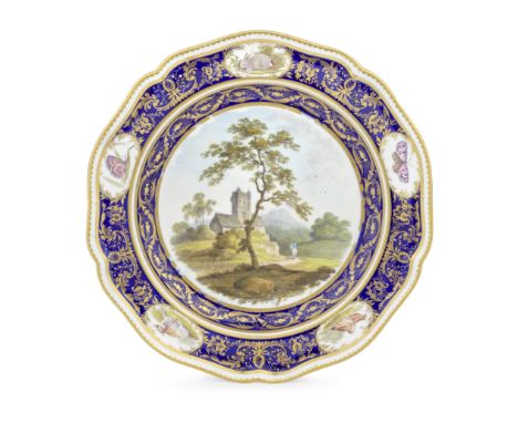 A Derby plate, circa 1805Of silver shape, the cavetto painted with a view 'Near Brailsford, Derbyshire', the blue borders fin