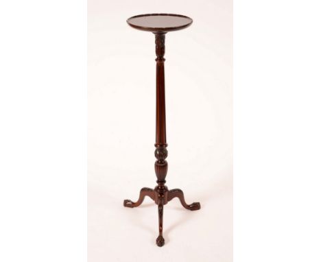 A Chippendale Revival mahogany statuary torchere, dished circular top above an acanthus capped fluted baluster column, furthe