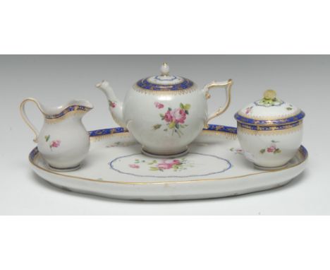 A Chelsea Derby cabaret service, enamelled with rose sprays and foliage, within blue bands with gilt fruiting vine, the globu