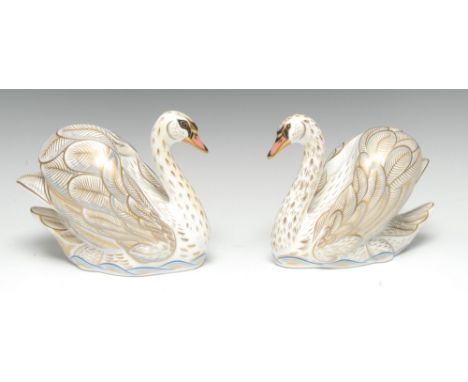 A pair of Royal Crown Derby paperweights, The Royal Swans, William and Catherine, exclusively commissioned by Goviers of Sidm