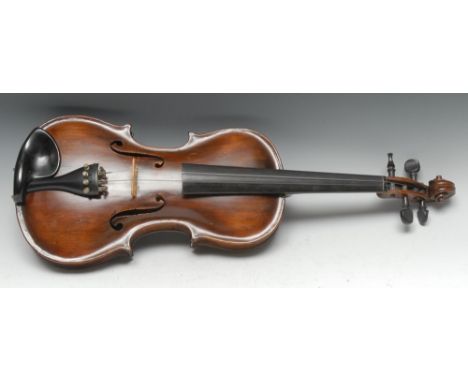 An early 19th century violin, 35.6cm two-piece back excluding button, ebony fingerboard and tuning pegs, carved scroll, outli