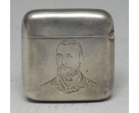 A Victorian silver rounded rectangular novelty vesta case, engraved with a portrait of a gentleman, hinged cover, striker to 