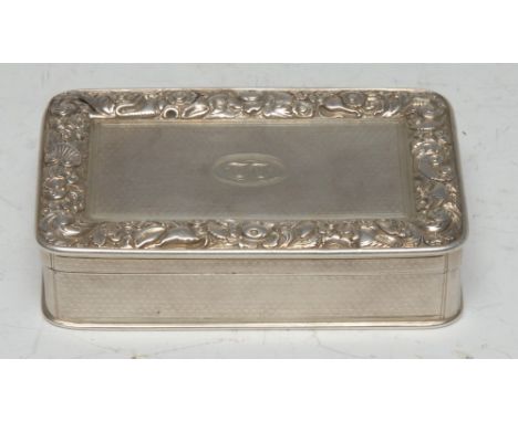 A George III silver rounded rectangular snuff box, hinged cover applied with a border of flowers, shells and scrolling foliag