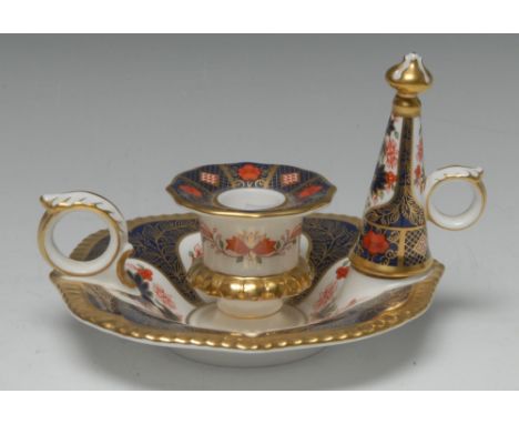 A Royal Crown Derby Old Imari 1128 pattern chamber stick and snuffer, 15cm diam, printed mark, boxed Condition Report: Good, 