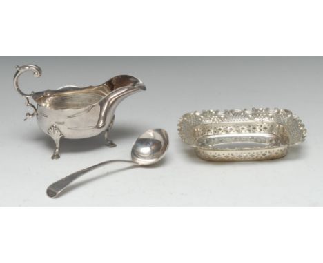 A Victorian silver shaped rectangular sweetmeat dish, pierced and  embossed with flowers, scrolls and trellis, 16cm wide, Atk