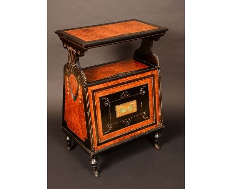 A Victorian Aesthetic movement amboyna and ebonised music room cabinet, rectangular top above an open tier, panelled fall fro