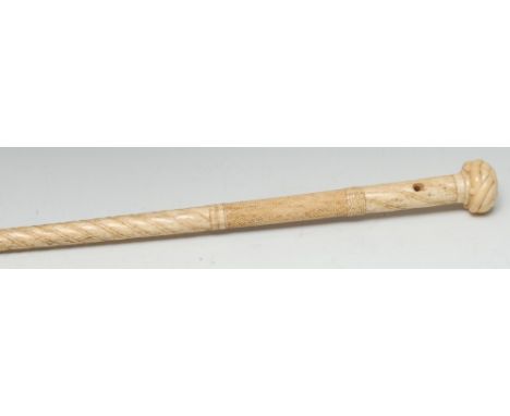 A mid-19th century sailor's whalebone and marine ivory walking stick, Turk's knot handle, spirally-turned, cross-hatched and 