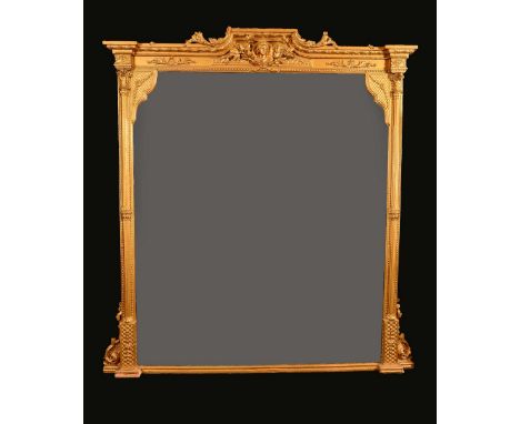 A large 19th century giltwood and gesso pier glass, arched cresting centred by a portrait roundel, shaped mirror plate, flank