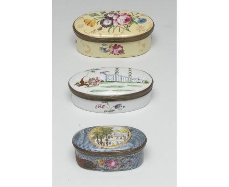 A George III South Staffordshire enamel oval snuff box, in relief and picked out in polychrome with a bouquet and sprigs of D