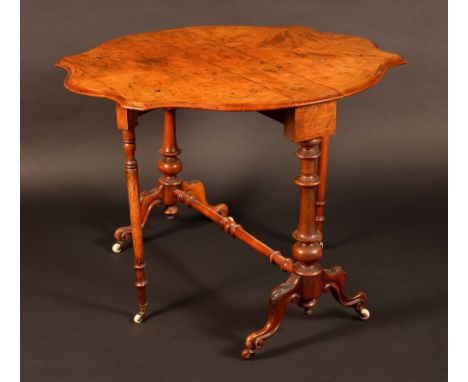 A Victorian burr walnut and marquetry shaped oval Sutherland table, moulded quarter-veneered top, turned end supports, acanth