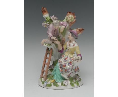 A Meissen figure group, The Egg Collector, modelled with a young boy up a ladder passing an egg to a lady below, in colours, 