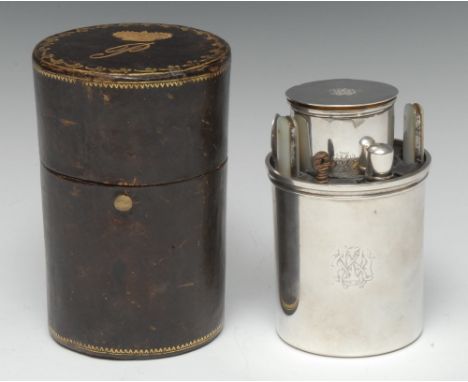 A Victorian silver campaign-type gentleman's travelling canteen, comprising beaker,  goblet, stacking condiments, spirit flas