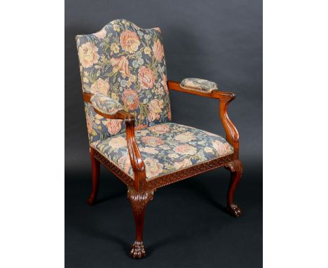 A George III Revival mahogany Gainsborough armchair, rectangular back with arched cresting, outswept scroll arms, 'Gothic Chi