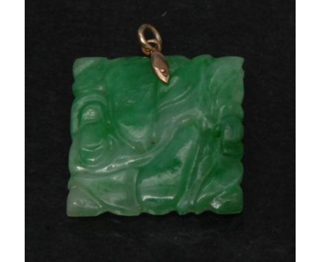 A carved green stone pendant, square stone possible Jade, as a fruiting vine, rose metal mount, unmarked, 19mm wide, 3g gross