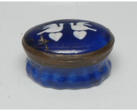 A George III South Staffordshire enamel oval patch box, of Wednesbury type, hinged cover painted in raised opaque with a pair