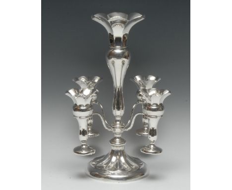 An Edwardian silver table centre epergne, central trumpet shaped flute with wavy rim, above four smaller conforming, each det