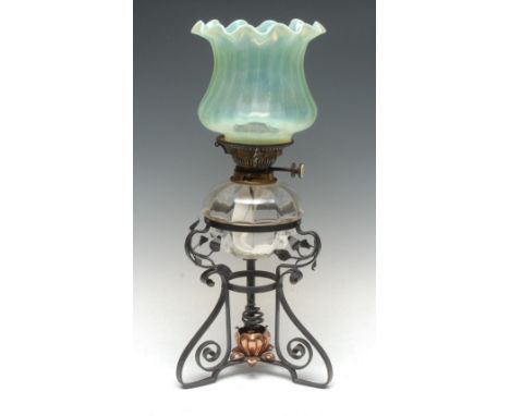 An Arts and Crafts oil lamp, in the manner of Benson, Hinks no.2 Duplex burner with ceramic button, clear glass reservoir,  f