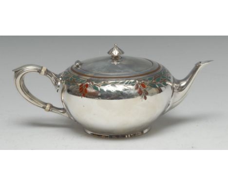 An American silver and enamel teapot, decorated in tones of red and green with branches laden with berries, scroll-capped han