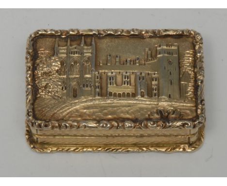 A William IV silver-gilt rounded rectangular castle top vinaigrette, the hinged cover with a view of Newstead Abbey, ancestra