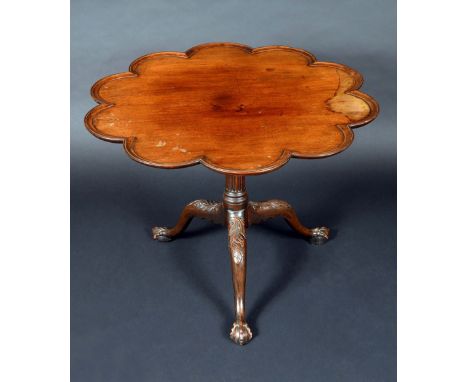 A Chippendale design mahogany lobed circular tripod supper table, dished tilting top, stop-fluted pillar, cabriole legs carve