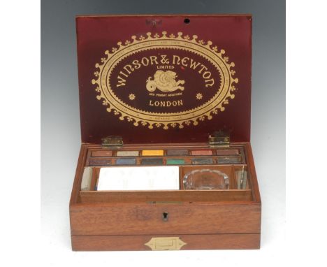 A Victorian mahogany rectangular artist's box, by Winsor &amp; Newton, London, hinged cover enclosing a lift-out tray with ce