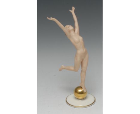 An Art Deco Hutschenreuther porcelain figure, Sonnenkind, modelled by Karl Tutter (1883-1969), the nude embraces the sun in e