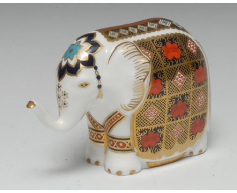 A Royal Crown Derby paperweight, Elephant, decorated in the 1128 Imari palette, printed marks, gold stopper, boxed; Condition