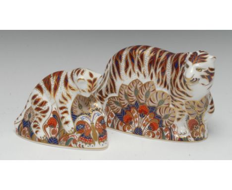 A Royal Crown Derby paperweight, Bengal Tiger, printed mark, gold stopper; another, Bengal Tiger Cub, printed mark, gold stop