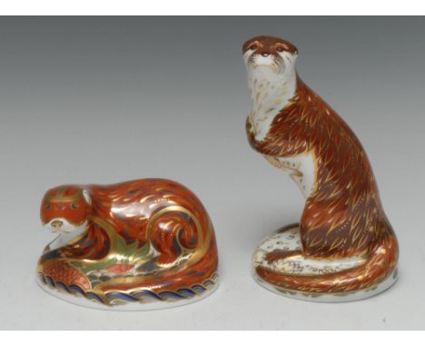 A Royal Crown Derby paperweight, Playful Otter, limited edition 42/250, printed mark, gold stopper, boxed;  another, Otter,  