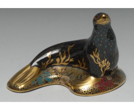 A Royal Crown Derby paperweight, Sea Lion, printed mark, gold stopper,boxed Condition Report: Good First