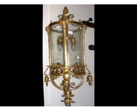 A decorative cast brass and glass porch lamp - 100cm long CONDITION REPORTBy our judgement, condition of lot is good.Notably,