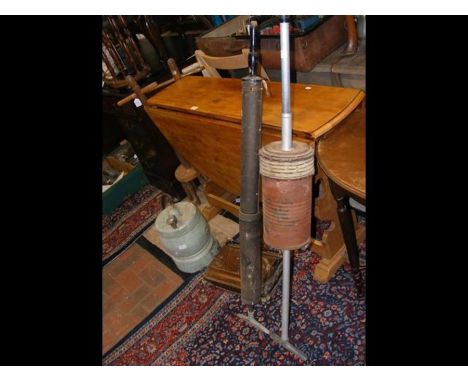 Two vintage early vacuum cleaners, together with an early potato peeler 