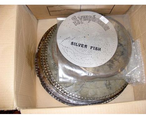Twenty Polyphon discs (15.5'' diameter) together with twelve Symphonium discs (10'' diameter)