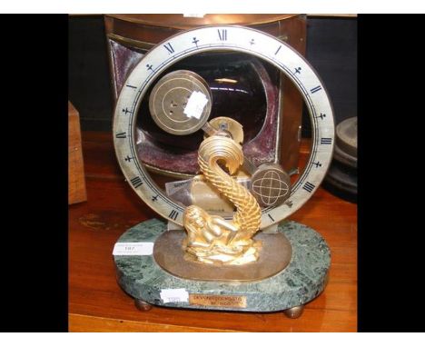 A Devon Clocks Limited 'mystery' mantel clock - 26cm high
