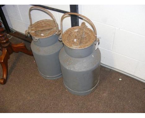 Two vintage milk churns 