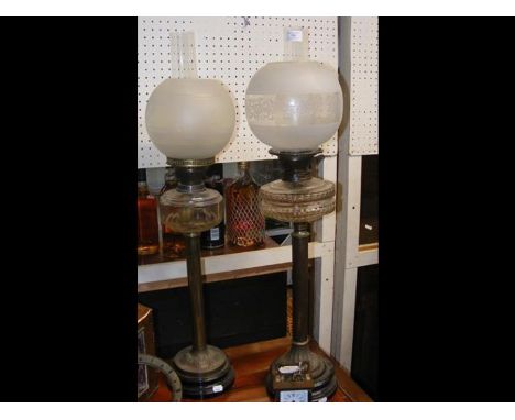 A Victorian oil lamp and one other