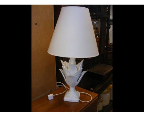 A decorative ceramic flower table lamp with shade 