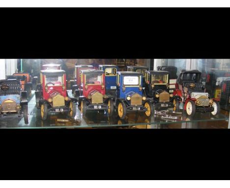 Six Schuco clock work vintage vehicles including the Ford Coupe 1917