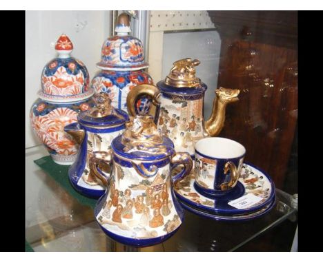 A satsuma tea set together with two Imari vases